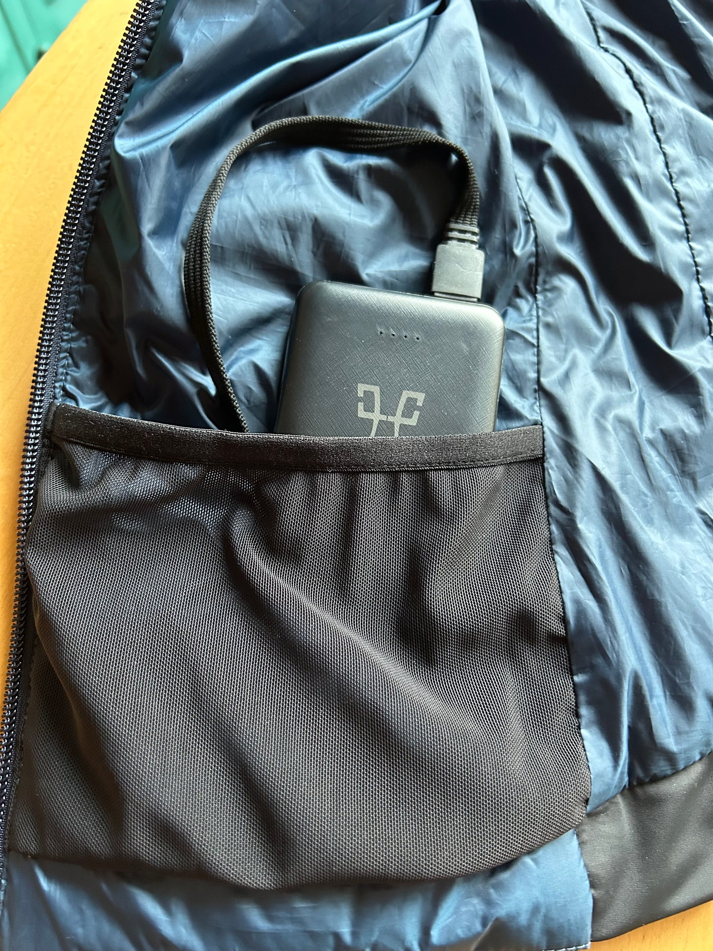 Beheizbare, ärmellose Daunenjacke