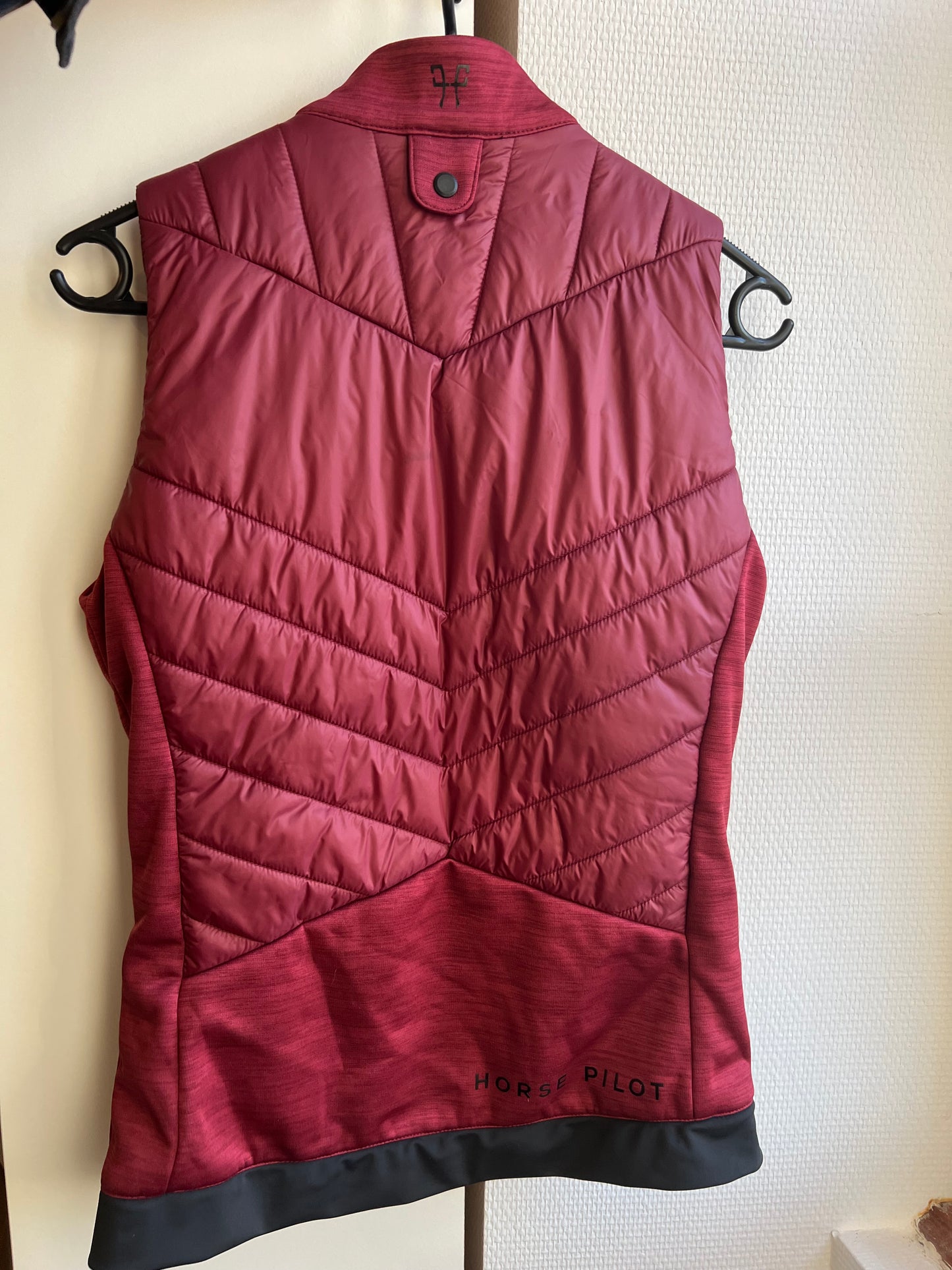 RIDER VEST • Sleeveless down jacket for women